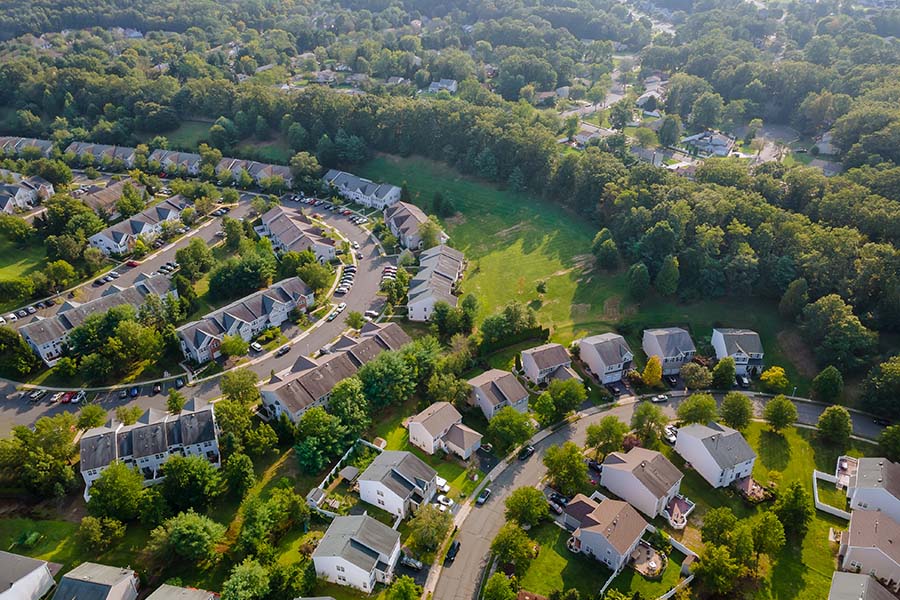 Bellbrook OH - Aerial View of a Residential Neighborhood in the Suburbs with Surrounding Green Foliage in Bellbrook Ohio